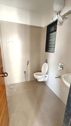 Bathroom in 2 BHK Apartment at Je and Vee Vrindavan, Malad East – for Rent