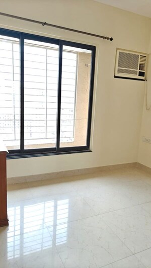 Room in 2 BHK Apartment at Goyal Lakshchandi Heights, Goregaon East – for Rent