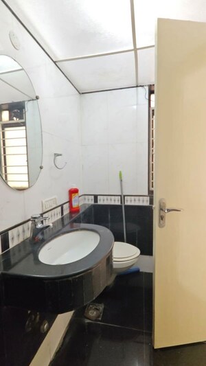 Bathroom in 2 BHK Apartment at Goyal Lakshchandi Heights, Goregaon East – for Rent