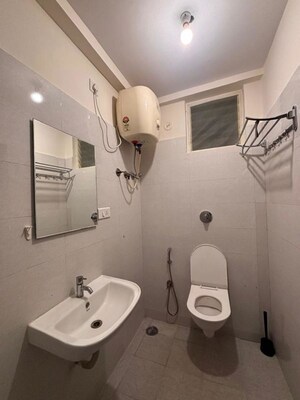 Bathroom in 2 BHK Apartment at Sudarshan Ruby, Indiranagar – for Rent