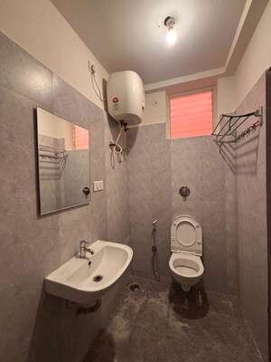 Bathroom in 2 BHK Apartment at Sudarshan Ruby, Indiranagar – for Rent