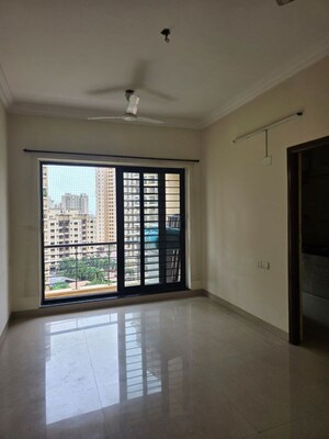 Living Room in 1 BHK Apartment at K Raheja Heights, Malad East – for Rent