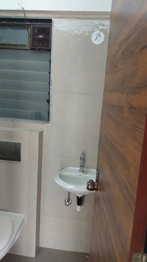 Bathroom in 1.5 BHK Apartment at Roha Satsang Bharti, Malad East – for Sale