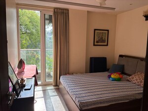 Bedroom in 3 BHK Builder Floor at Sarvodaya Enclave – for Sale
