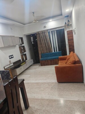 Living Room in 1 BHK Apartment at Siddha Sky, Sion – for Rent