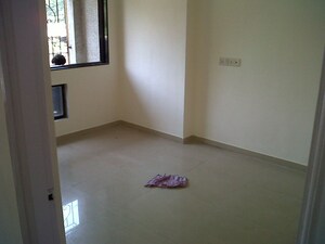 Room in 2 BHK Apartment at Integrated Kamal, Mulund West – for Rent