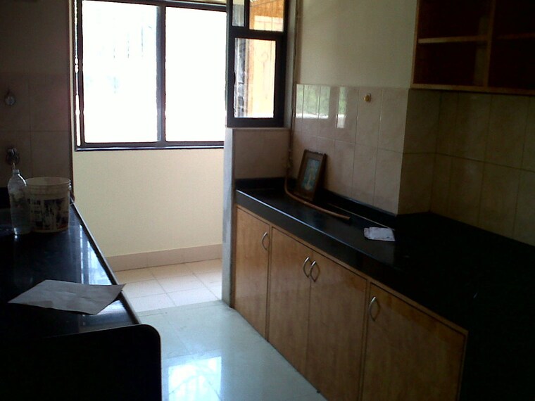 Kitchen, integrated-kamal 2 Bedroom 655 Sq.Ft. Apartment In Mulund West Mumbai 10592977