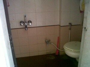 Bathroom in 2 BHK Apartment at Integrated Kamal, Mulund West – for Rent
