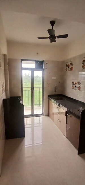 Kitchen in 2 BHK Apartment at Om Fair Township, Dhansar – for Sale