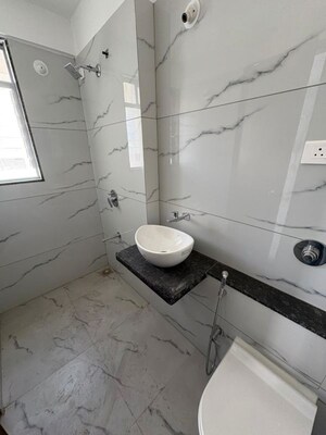 Bathroom in 3 BHK Apartment at Paranjape Schemes Yuthika, Baner – for Rent