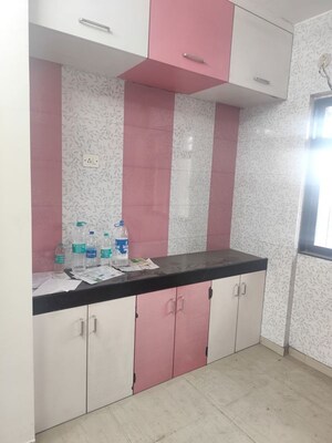 Kitchen in 2 BHK Apartment at Raunak Unnathi Greens, Kasarvadavali – for Rent
