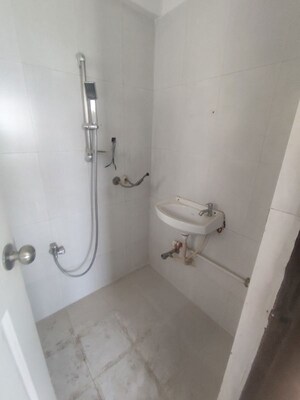 Bathroom in 2 BHK Apartment at Raunak Unnathi Greens, Kasarvadavali – for Rent