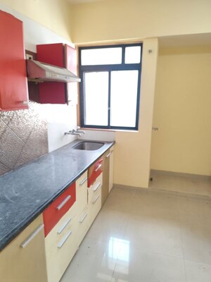 Kitchen in 1 BHK Apartment at Puranik Hometown, Ghodbunder Road – for Sale