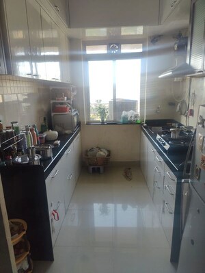 Kitchen in 2 BHK Apartment at Ashar Axis, Majiwada – for Rent