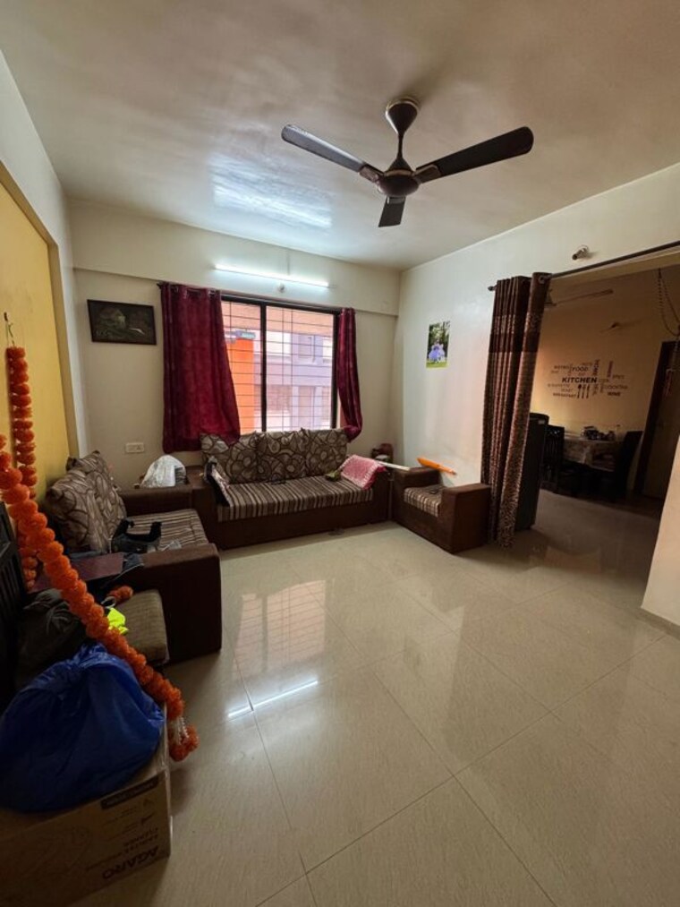 Living Room, raichandani-megha-terrace-chs 2 Bedroom 900 Sq.Ft. Apartment In Aundh Pune 10593130