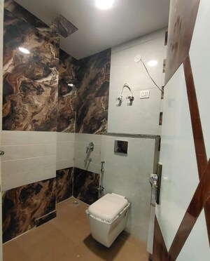 Bathroom in 4 BHK Builder Floor at Dwarka Mor – for Rent