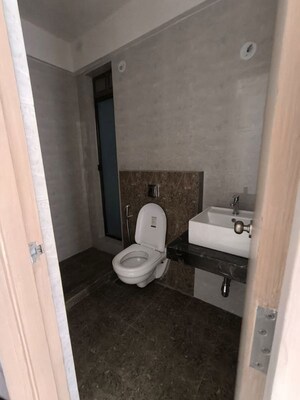 Bathroom in 2 BHK Apartment at Rajesh Raj Infinia, Malad West – for Rent