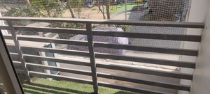 Balcony in 2 BHK Apartment at Shubham Pleasure, Sanand – for Rent