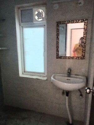 Bathroom in 3 BHK Apartment at Amrapali Dream Valley – for Rent