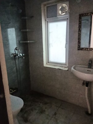 Bathroom in 3 BHK Apartment at Amrapali Dream Valley – for Rent