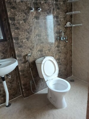 Bathroom in 3 BHK Apartment at Amrapali Dream Valley – for Rent