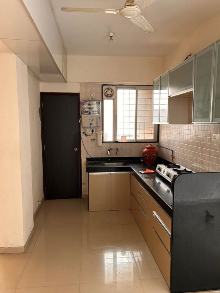Kitchen, sonigara-excluzee 2 Bedroom 750 Sq.Ft. Apartment In Wakad Pune 10590949