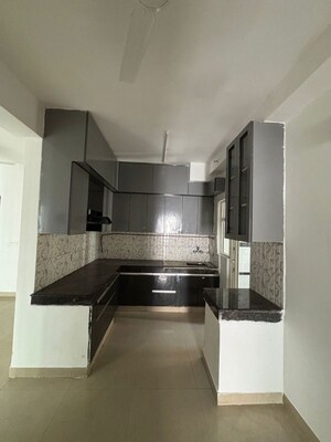 Kitchen in 2 BHK Apartment at Casa Woodstock, Sector 16c Greater Noida – for Sale
