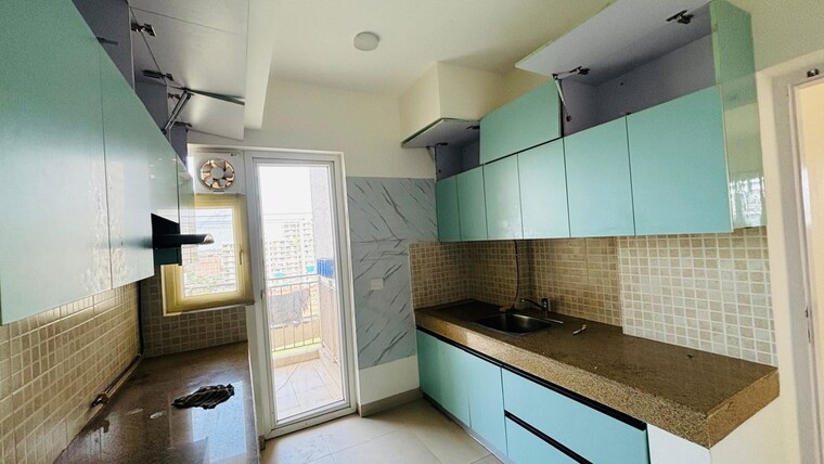 Kitchen, emaar-gurgaon-greens 3.5 Bedroom 1650 Sq.Ft. Apartment In Sector 102 Gurgaon 10593691