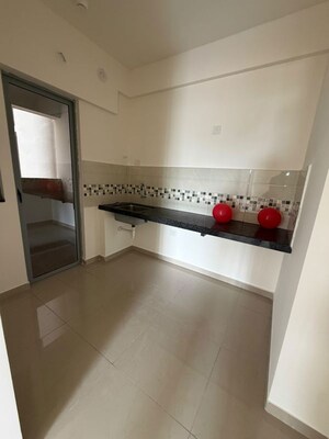 Kitchen in 2 BHK Apartment at Mahindra Tathawade, Tathawade – for Rent