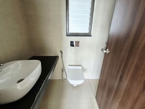 Bathroom in 1.5 BHK Apartment at Runwal My City Phase II Cluster 05, Dombivli East – for Rent