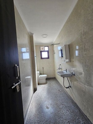Bathroom in 1 BHK Apartment at Freedom Fighters Enclave – for Rent