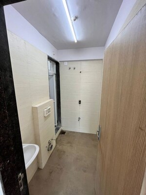 Bathroom in 2 BHK Apartment at Newlook Bhavya Elite, Wadala – for Rent