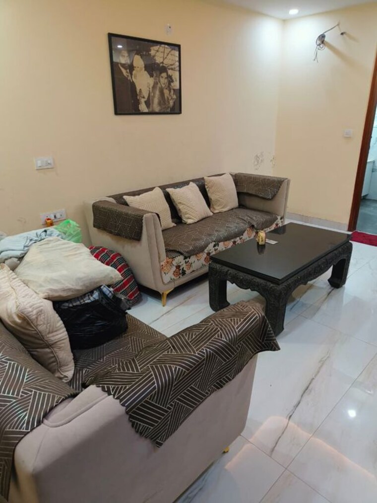 Living Room, rwa-apartments-sector-19 1 Bedroom 800 Sq.Ft. Builder Floor In Sector 19 Noida 10593954