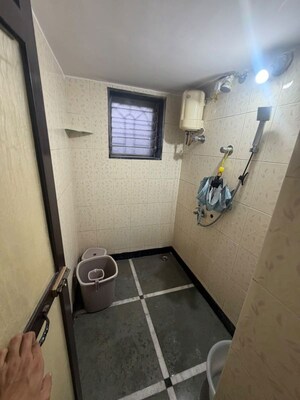 Bathroom in 1 BHK Apartment at Brightland Phase 1 CHS, Balkum Pada – for Rent