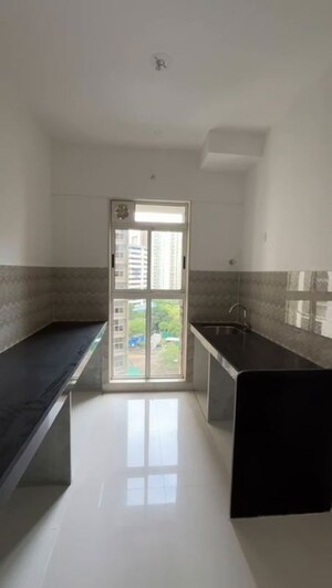 Kitchen in 1.5 BHK Apartment at Lodha Upper Thane Woodlands G H I, Anjur – for Sale