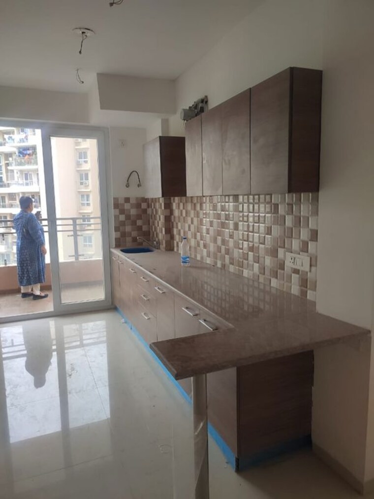 Kitchen, tulip-violet 3 Bedroom 1421 Sq.Ft. Apartment In Sector 69 Gurgaon 10593987