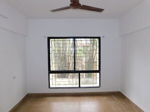 Room in 2 BHK Apartment at Mittal Brothers Whistling Palms, Wakad – for Sale