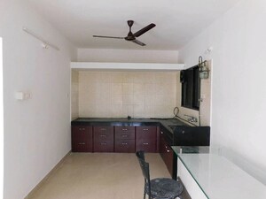 Kitchen in 2 BHK Apartment at Mittal Brothers Whistling Palms, Wakad – for Sale