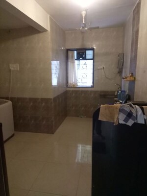 Kitchen in 3 BHK Apartment at Moroccan Cooperative Housing Society, Goregaon East – for Sale