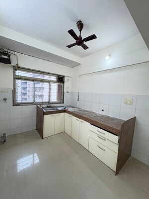 Kitchen in 2.5 BHK Apartment at Kanakia Spaces Niharika, Manpada – for Rent