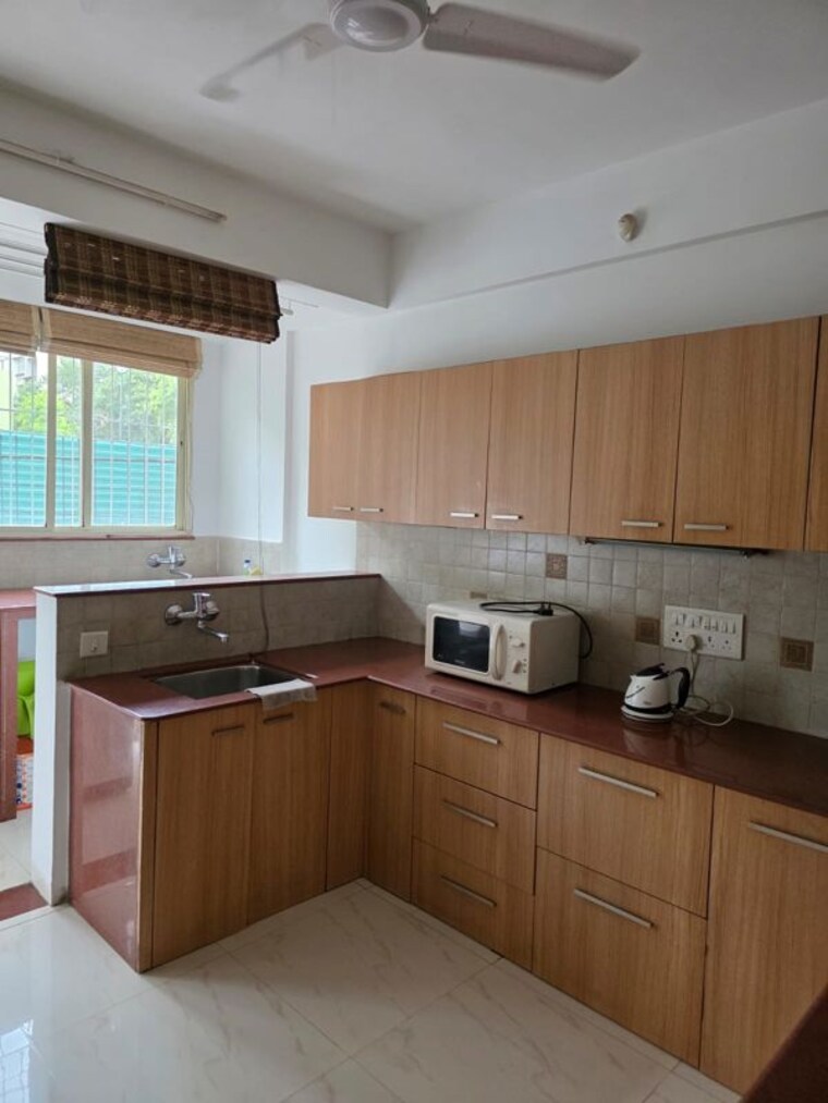 Kitchen, pearl-apartments-baner 3 Bedroom 1000 Sq.Ft. Independent House In Baner Pune 10512062