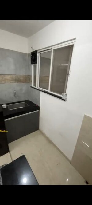 Kitchen in 2 BHK Apartment at Chintamani Apartment, Baner – for Sale