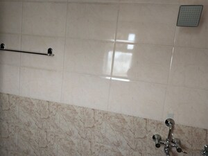 Bathroom in 3 BHK Apartment at Ansal Larchwood Villa, Sushant Golf City – for Sale