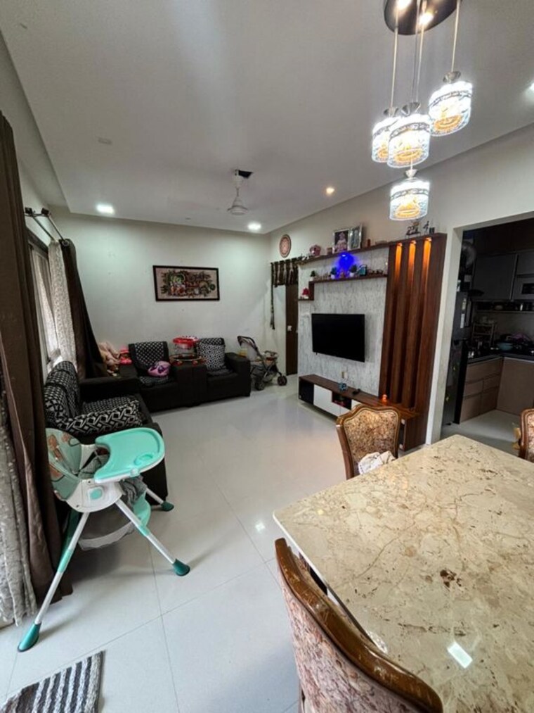 Living Room, millennium-acropolis-2 2 Bedroom 704 Sq.Ft. Apartment In Wakad Pune 10472350