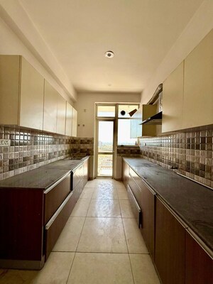 Kitchen in 3 BHK Apartment at Sushma Crescent, Dhakoli – for Sale