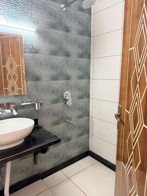 Bathroom in 1.5 BHK Builder Floor at Aman Vihar – for Rent