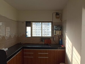 Kitchen in 2 BHK Apartment at Pimple Saudagar – for Sale