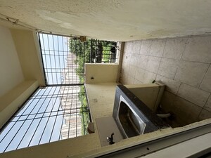 Kitchen in 2 BHK Apartment at Paramount Floraville, Sector 137 – for Rent