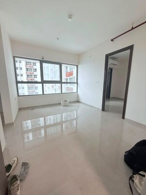 Living Room in 2 BHK Apartment at Kalpataru Immensa, Kolshet Road – for Rent
