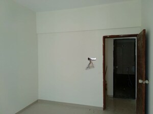 Room in 2 BHK Apartment at Windows CHS, Sus – for Sale